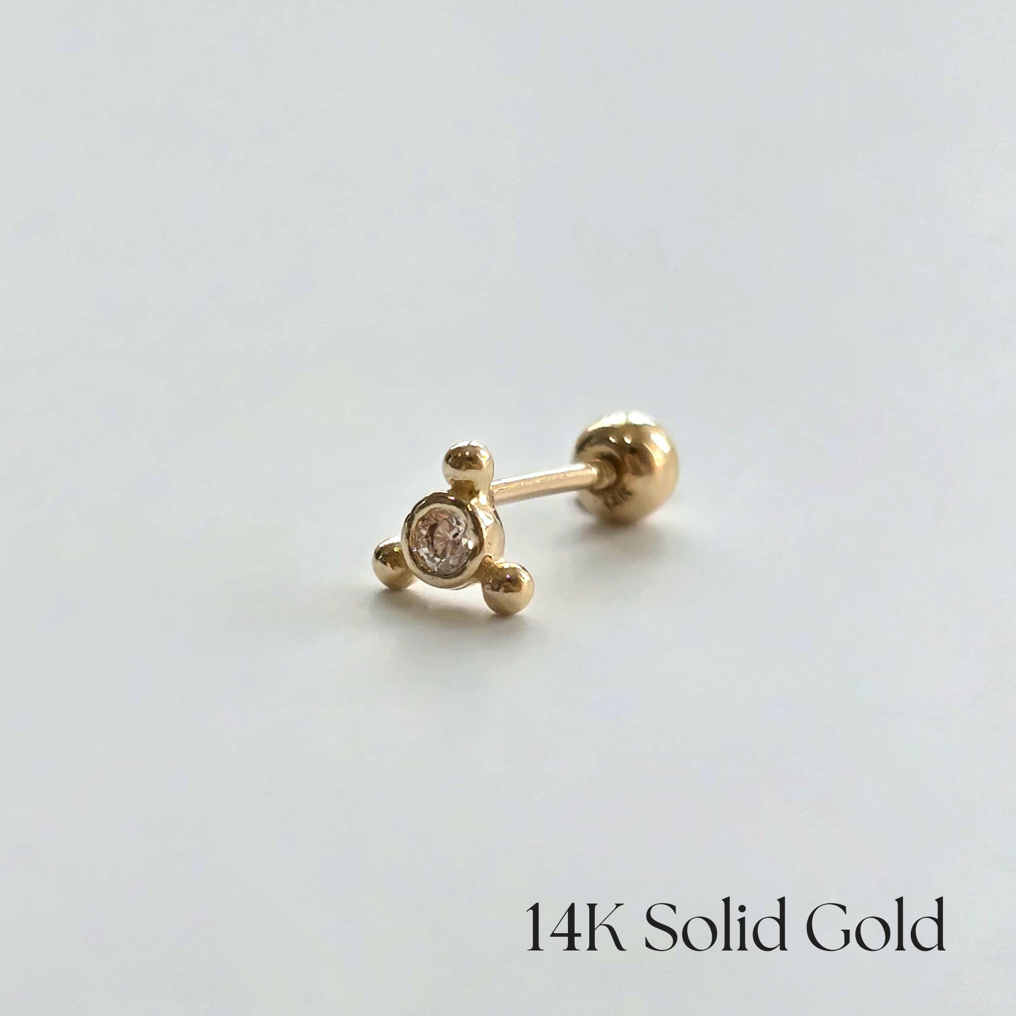 Close-up side view of Nebula Cartilage Earring showing 4mm circular crystal setting