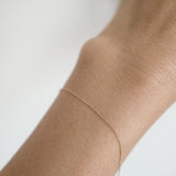 Model wearing the Paris Chain Bracelet solo for a subtle, elegant look