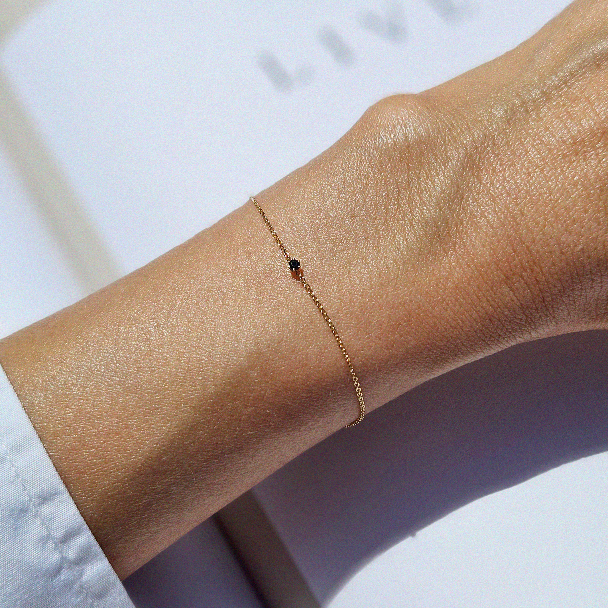 Petite crystal bracelet with minimal design featuring a delicate stone for elegant, understated style
