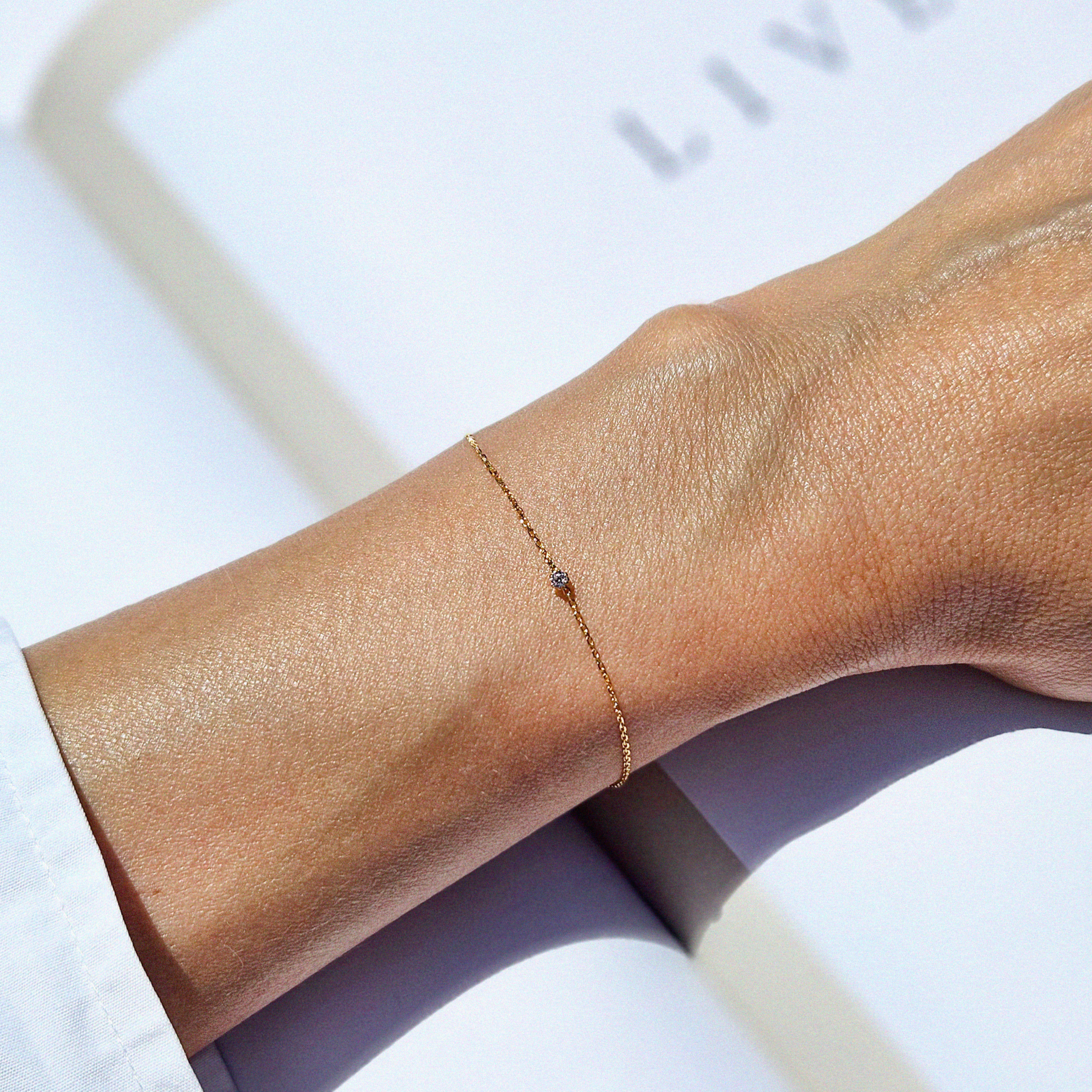 Petite crystal bracelet with minimal design featuring a delicate stone for elegant, understated style