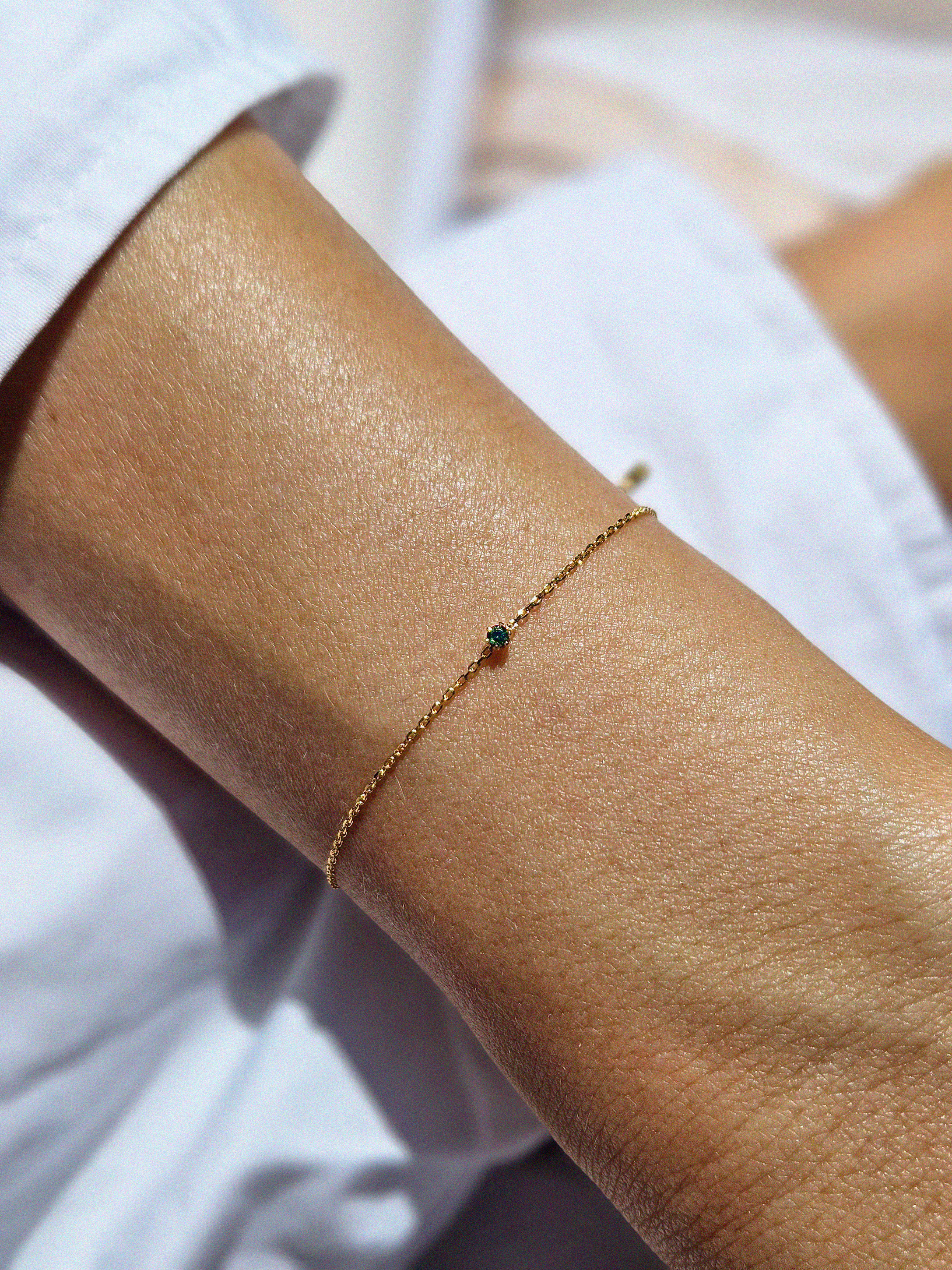 Petite crystal bracelet with minimal design featuring a delicate stone for elegant, understated style