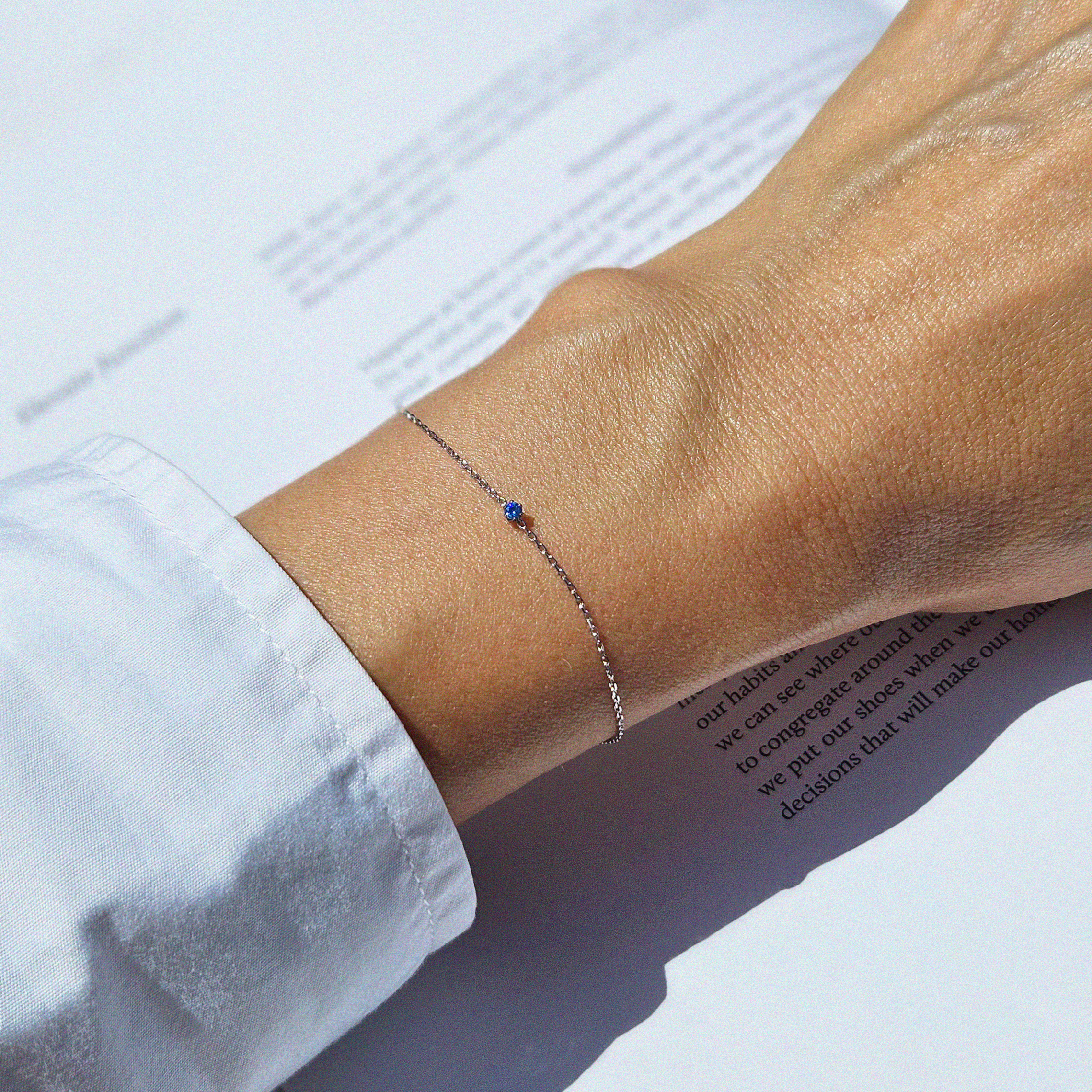 Petite crystal bracelet featuring a delicate stone and fine chain, perfect for elegant jewelry collections.