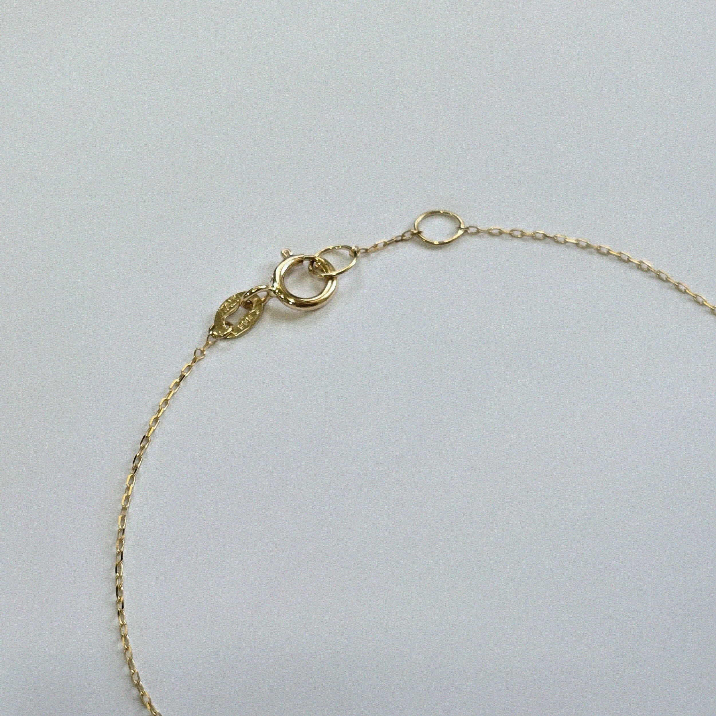 14K Petite Cross Bracelet.