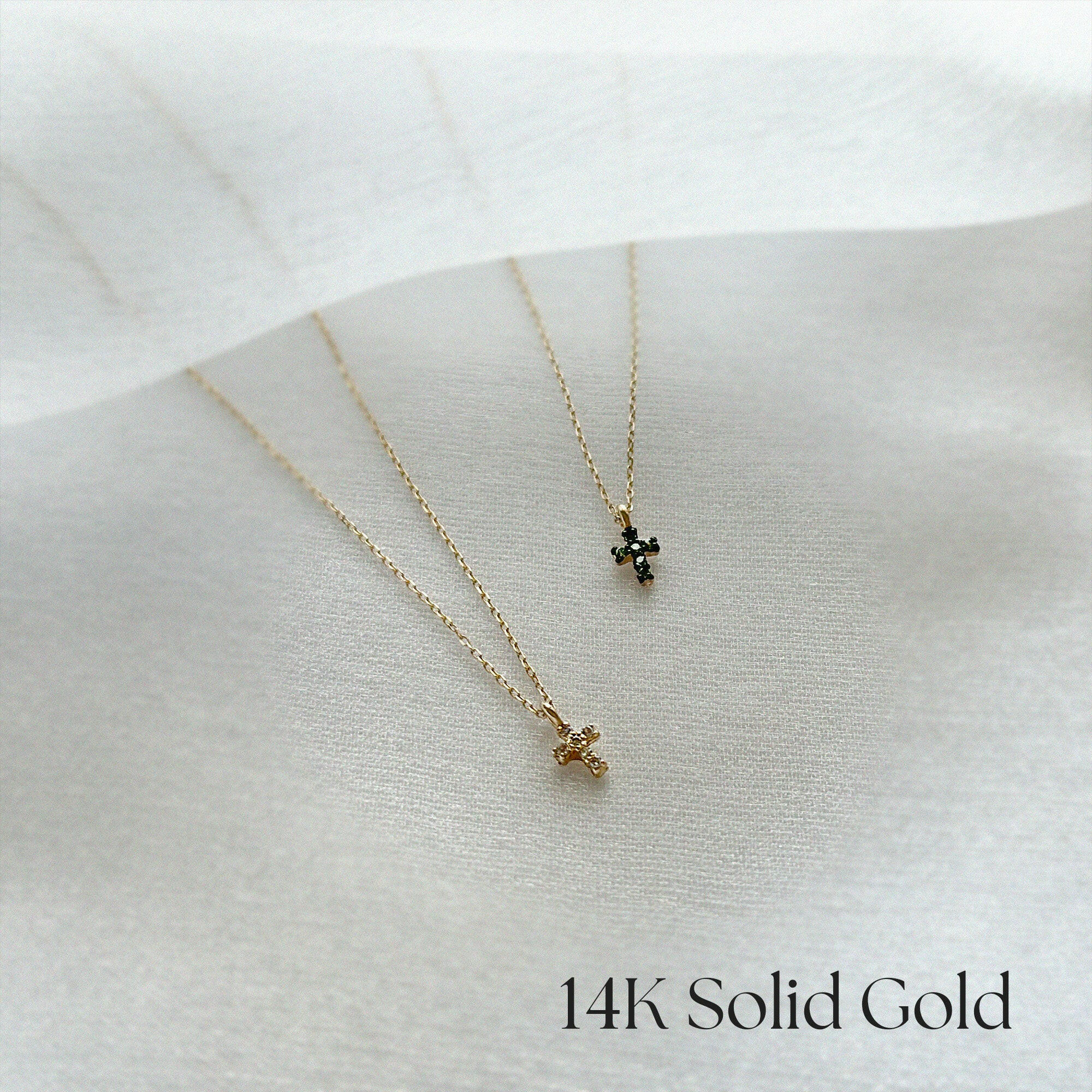 14K Petite Diamond Cross Necklace with clear or green stone, dainty cross pendant photographed