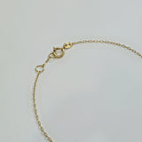 Detailed image of clasp and center diamond on fine chain bracelet