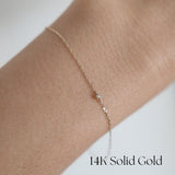 Model wearing Petite Diamond Bracelet solo for a refined, elegant look
