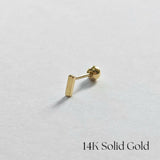 Side profile of 14K gold bar cartilage earring with minimalist design