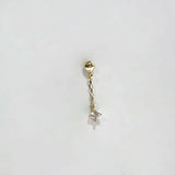 Close-up profile shot of the drop earring highlighting chain movement and polish