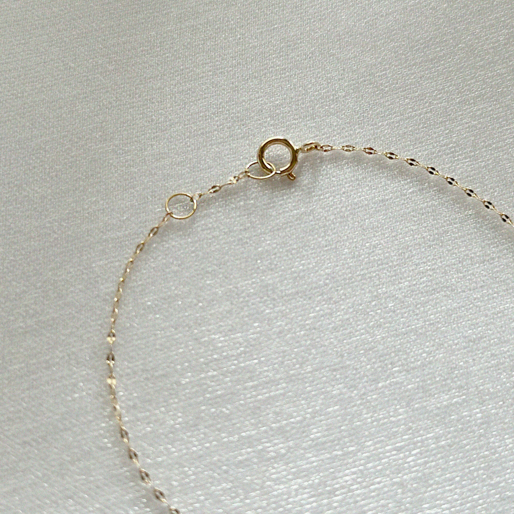 Macro view of handcrafted fine chain design and clasp details