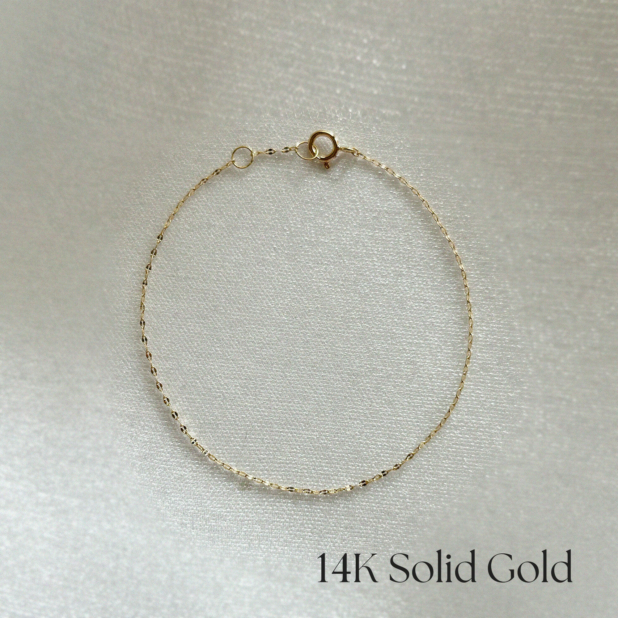 14K Roma Chain Bracelet with ultra-fine gold links displayed on a clean white background