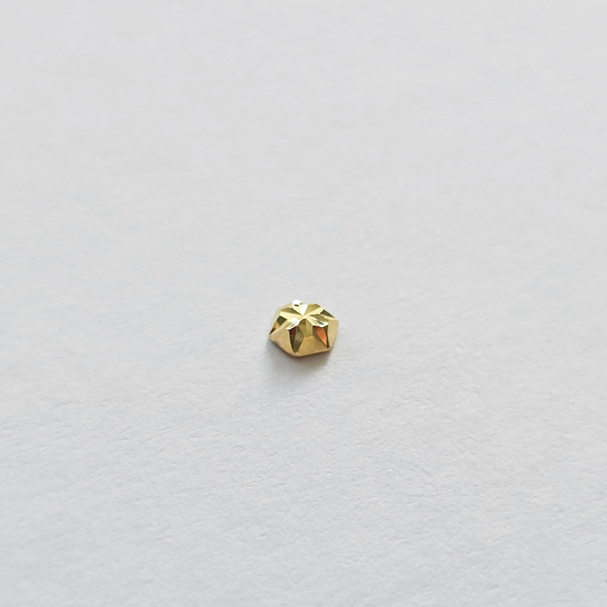 Shiny Hexagon Cartilage Earring side angle showcasing geometric cut