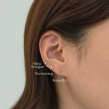 Boomerang cartilage earring layered with Laondrim cartilage earring for bold styling