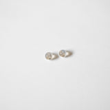 Pair of clear silicone earring backs with visible 14K yellow gold core