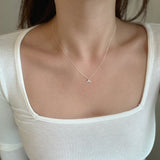 Dainty whale tail pendant with sleek chain, ocean charm jewelry inspired by marine life