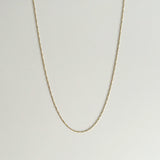 The entire 14K Torino necklace arranged to show chain length and curvature