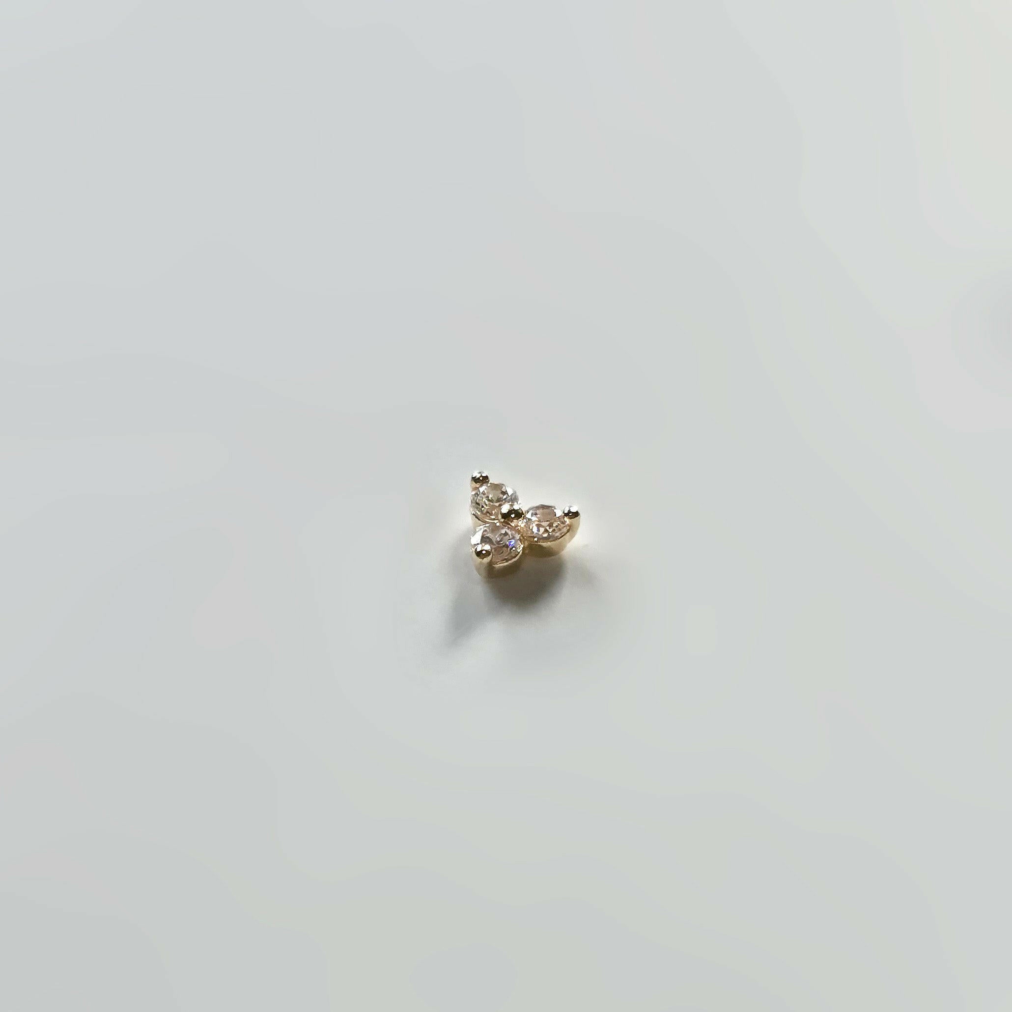 Close-up of the earring’s curved placement
