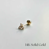 Side view of the 14K gold Trio Crystal Cartilage Earring, showing subtle sparkle