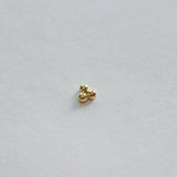 Three-ball cluster cartilage stud earring side profile photo