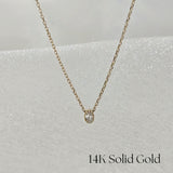 Bella Luce necklace laid flat with centered zirconia pendant – minimal elegance