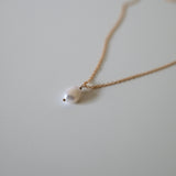 Close-up of 9mm freshwater pearl on fine gold filled chain