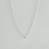 Full view of Diamond Accent Necklace with centered 4mm bezel-set diamond on fine gold chain