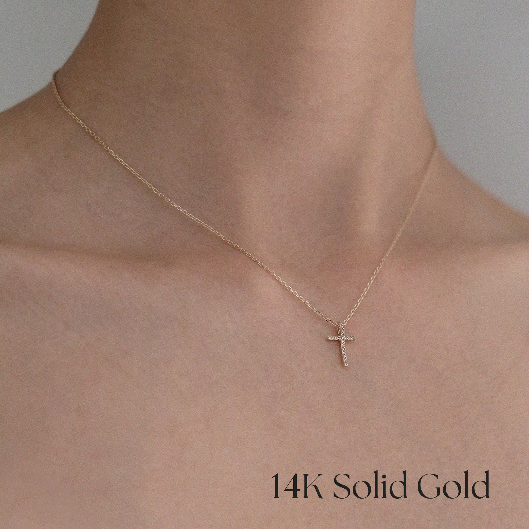 Model wearing Diamond Croce necklace – cross pendant sits at collarbone