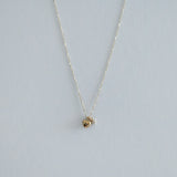 14K Solid Gold Amour Necklace displayed against a clean backdrop, highlighting puffed heart and sparkling cubic zirconia