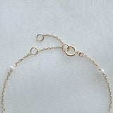 Close-up of the 14K gold clasp and extender on the Ariel’s Pearl Bracelet