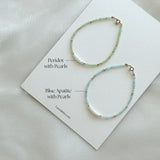 Gemma Beads Bracelet resting on Laondrim signature branding card