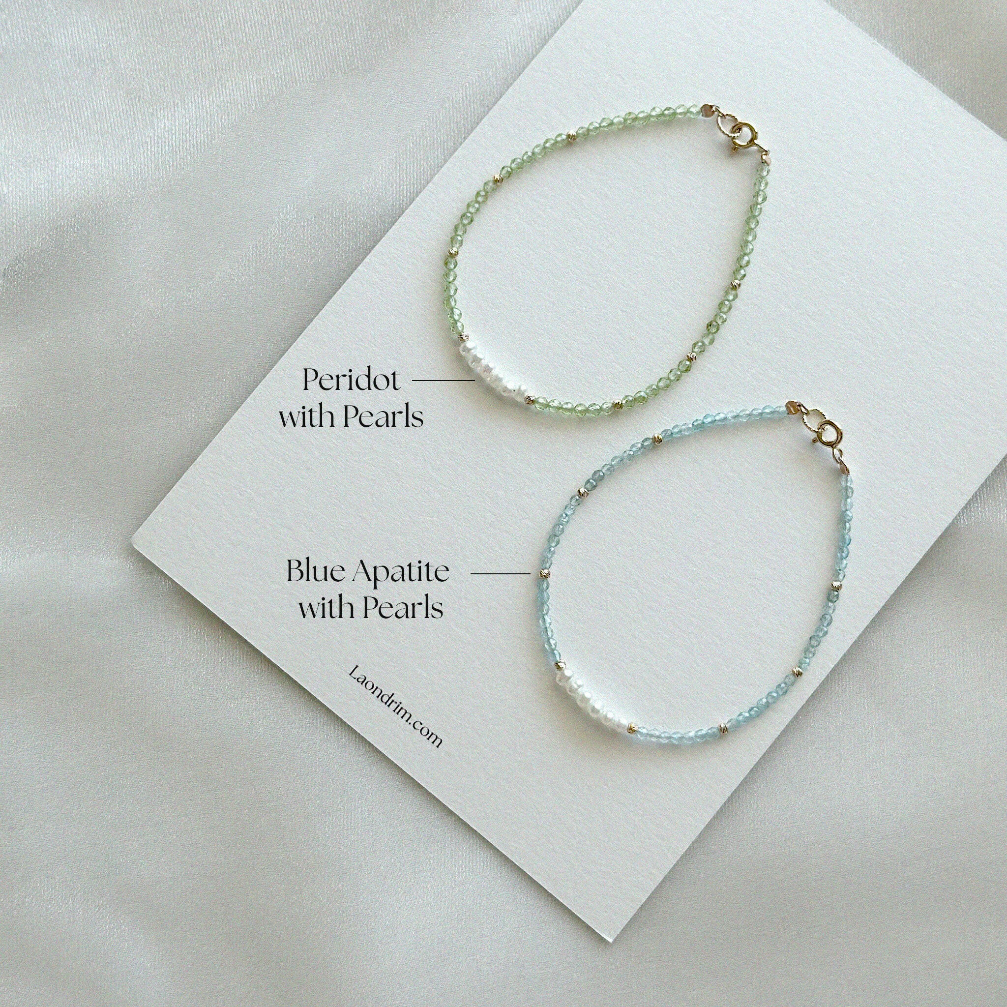 Gemma Beads Bracelet resting on Laondrim signature branding card