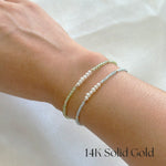 Model wearing Gemma Beads Bracelet with Blue Apatite gemstones and Peridot