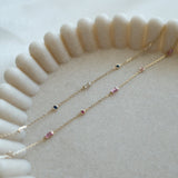14K Rhea Stone Bracelet displayed on a beige stone tray with natural lighting