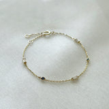 14K Rhea Stone Bracelet featuring Rainbow Moonstone and Blue Sapphire on a white background