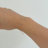 Close-up of the Rhea Bracelet with Pink Sapphire on wrist