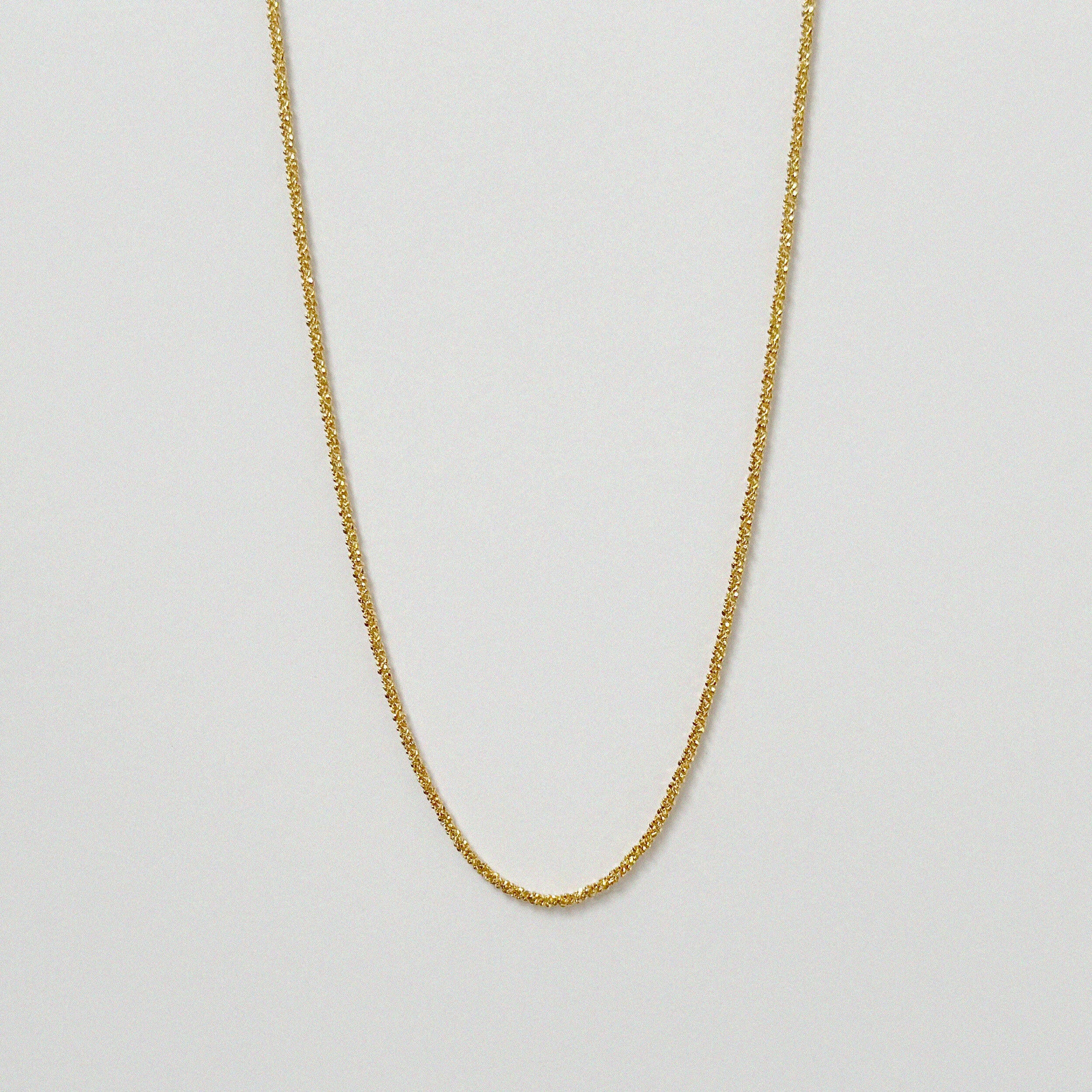 Basa Necklace displayed solo highlighting its thick yet elegant link design