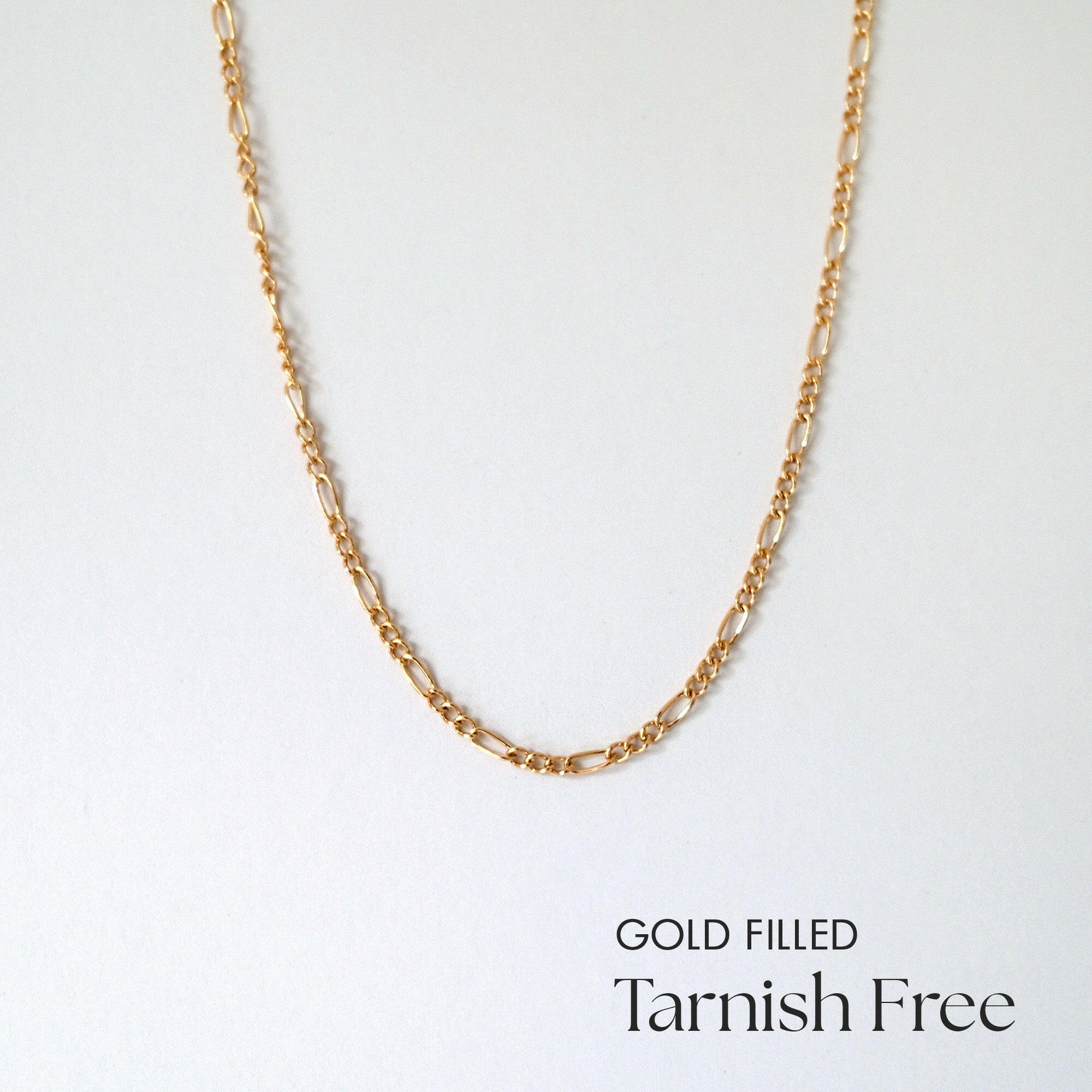 B Figaro Chain Necklace laid flat showing classic alternating links