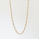 Babel Chain Necklace with engraved links laid flat