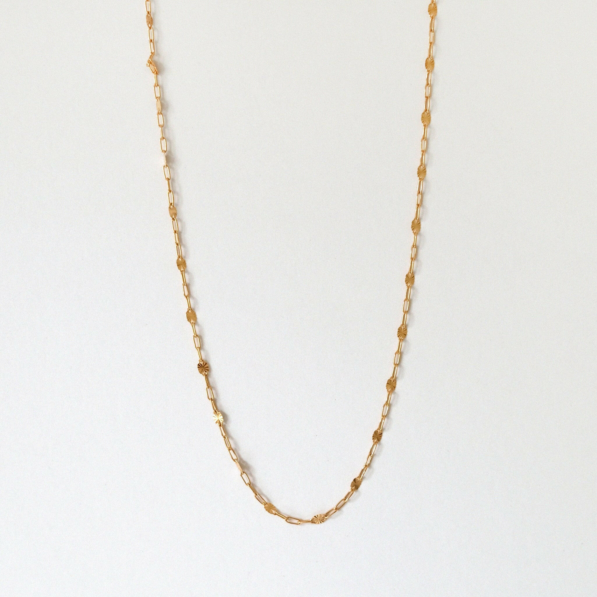 Babel Chain Necklace with engraved links laid flat
