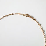 Close-up of spring ring clasp and connector spacing