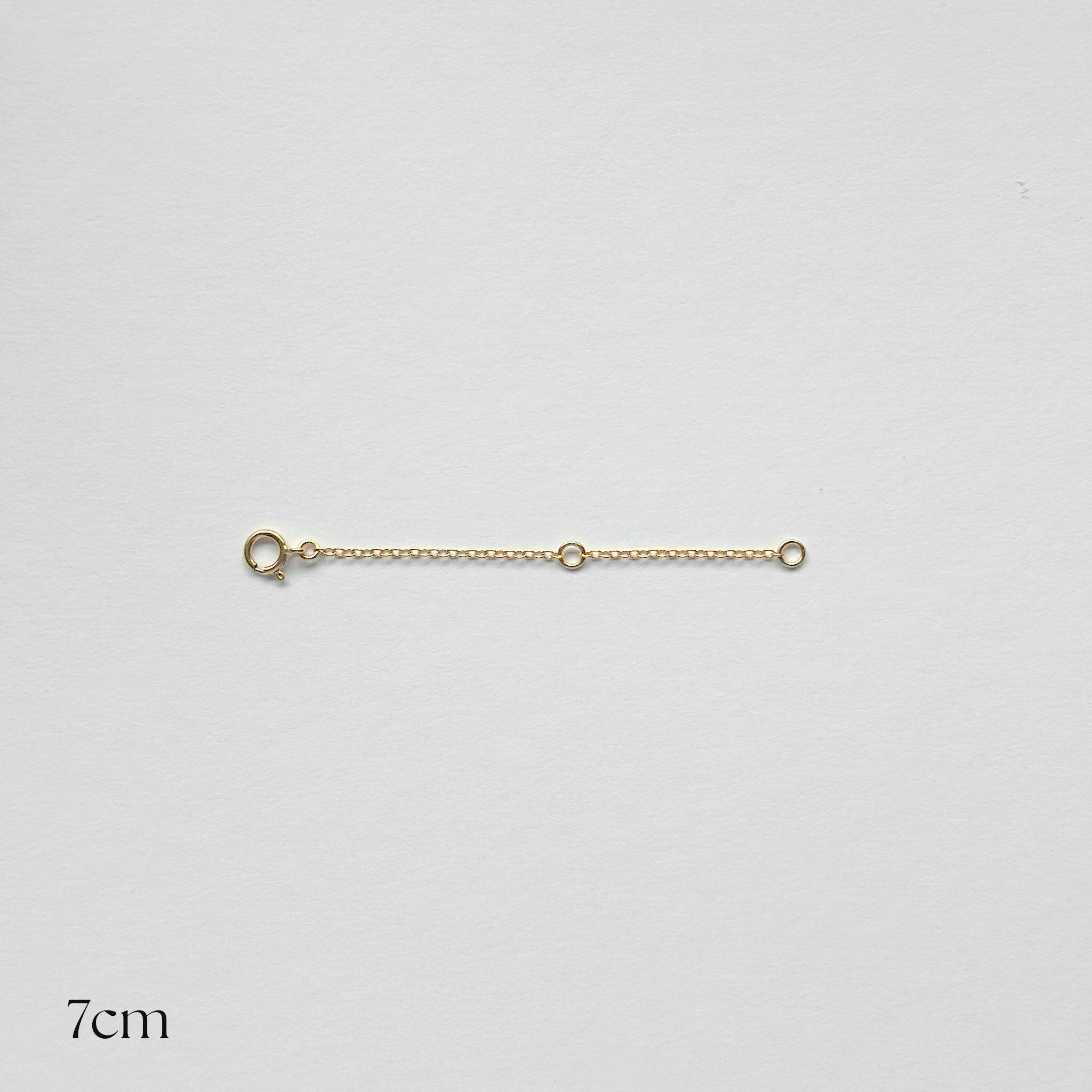 Gold filled extension chains laid flat in 7cm lengths