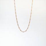 Necklace displayed on neutral bust highlighting sparkle and structure
