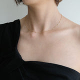 Model wearing beaded chain alone