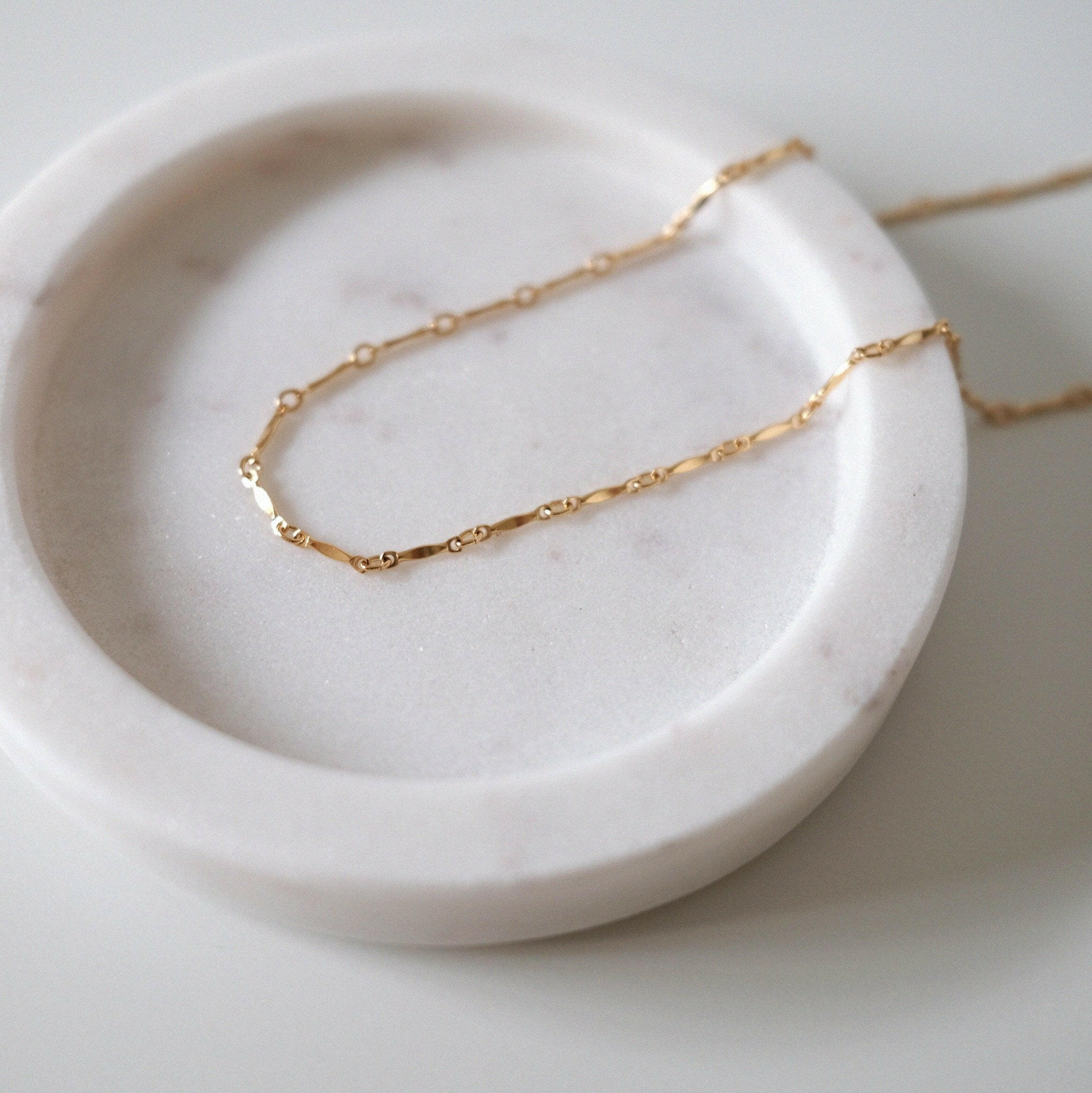 Lydia Chain Necklace laid flat showing bar and ring pattern