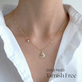 Model wearing Maris Shell & Pearl Necklace