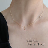 Ocean-themed gold filled necklace with starfish charm and pearls