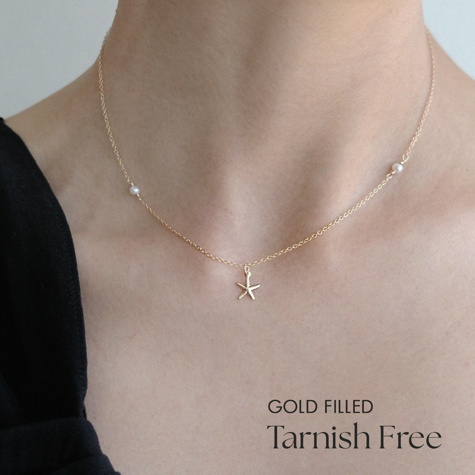 Ocean-themed gold filled necklace with starfish charm and pearls