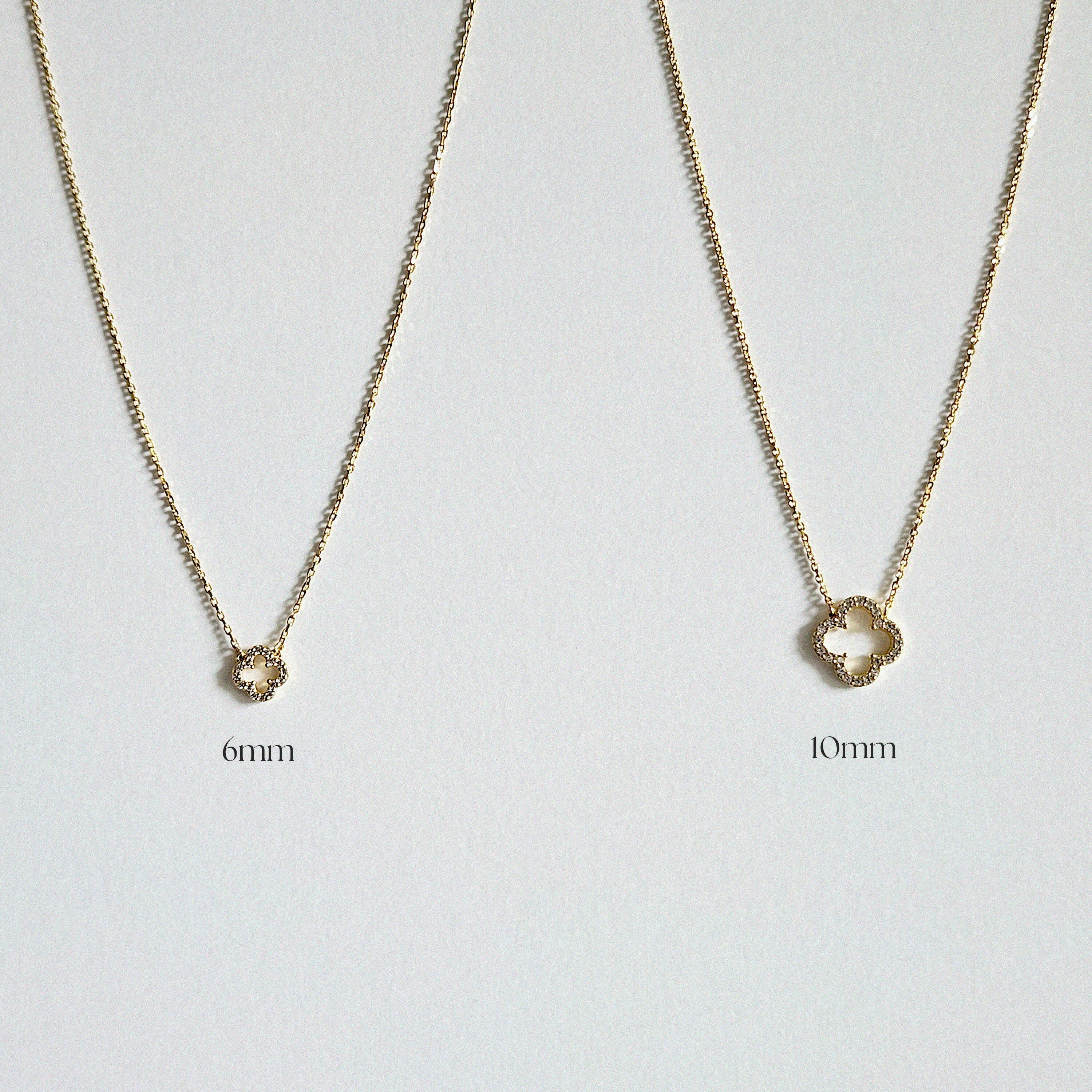 Gold clover necklaces in 6mm and 10mm displayed side by side for size comparison
