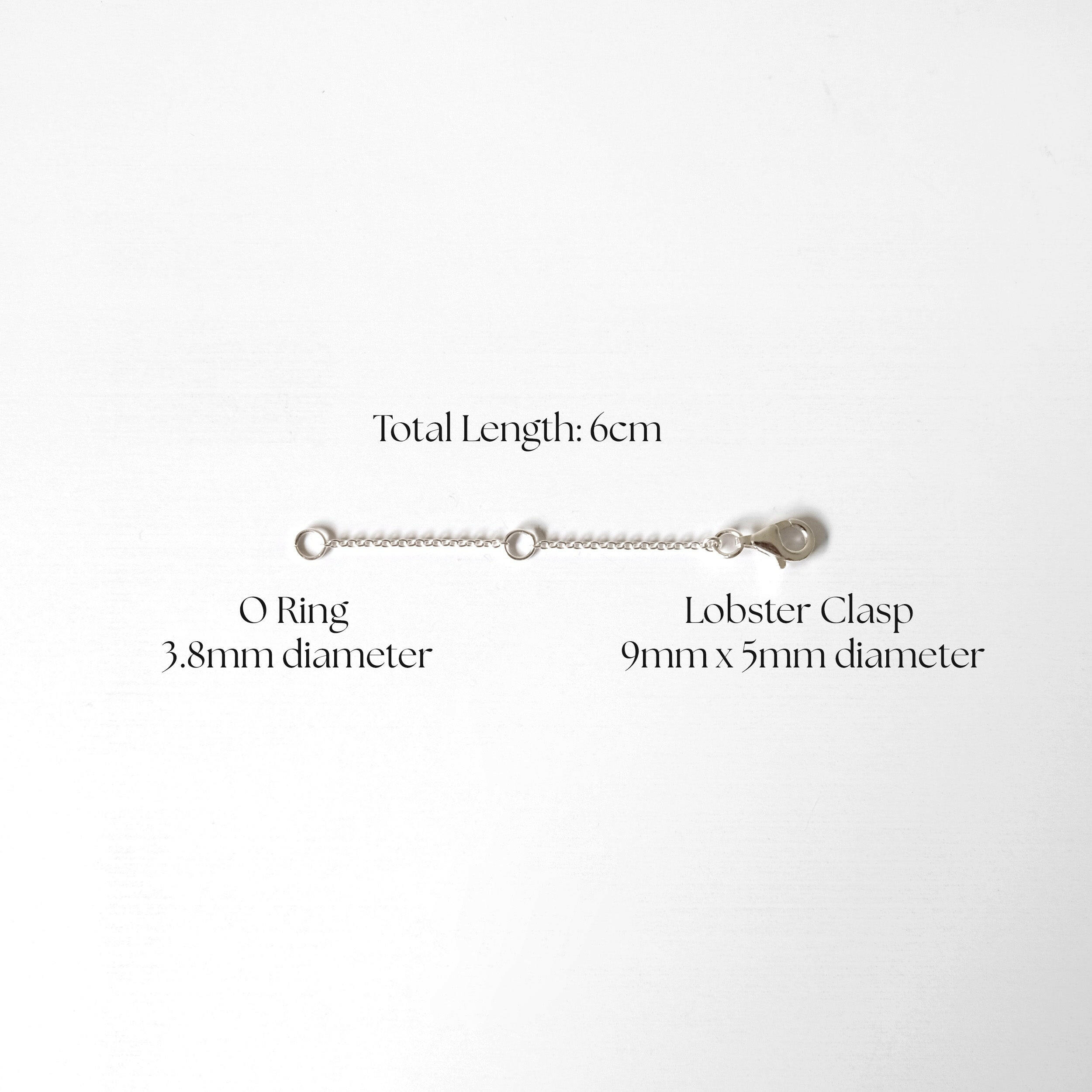 Side-by-side display of silver and gold 7cm chain extenders showing clasp detail.
