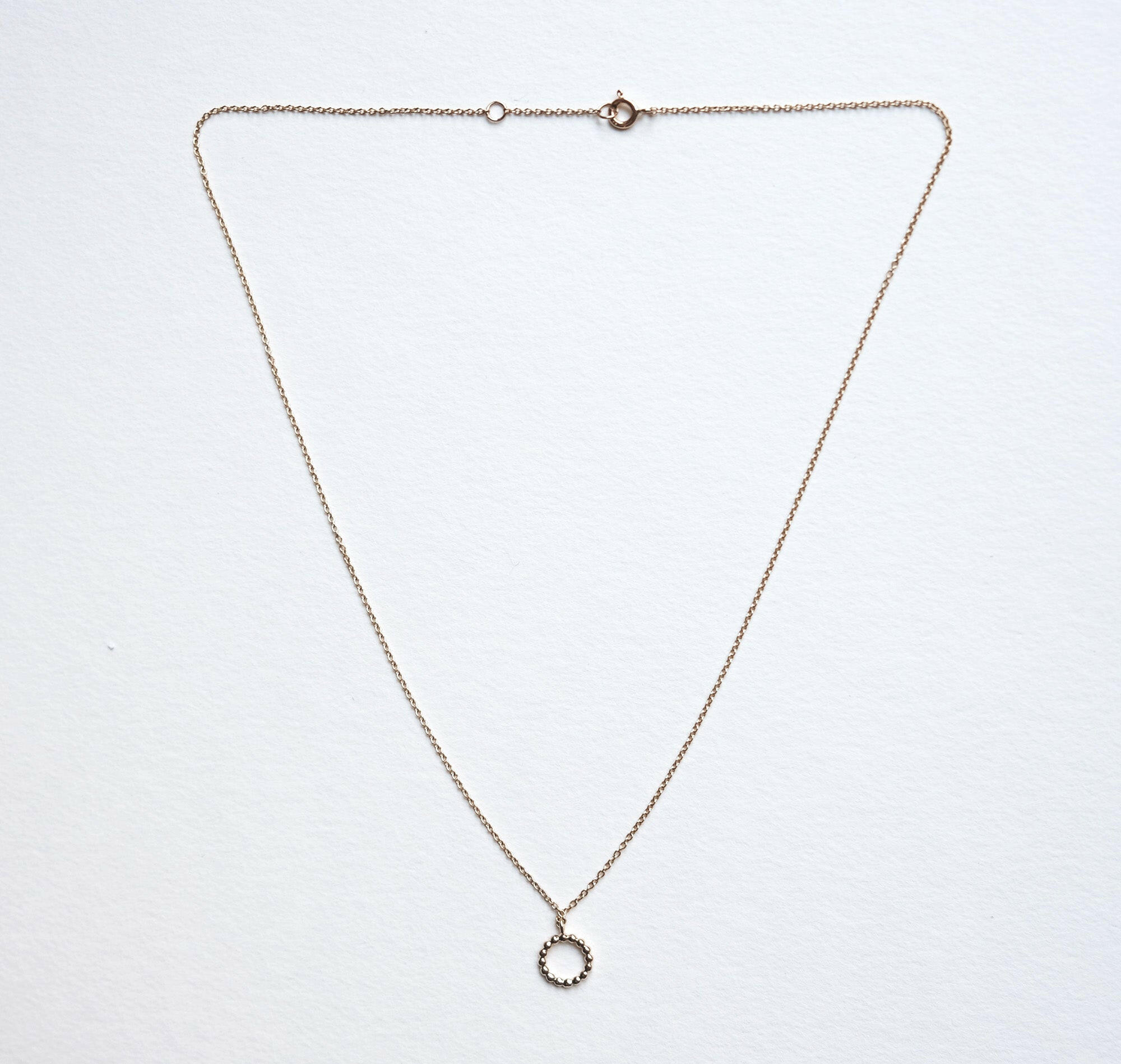 Straight-on view of the full Calla Necklace against a neutral backdrop