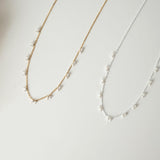 Elegant pearl necklace showcasing lustrous pearls, perfect for formal occasions and timeless style.